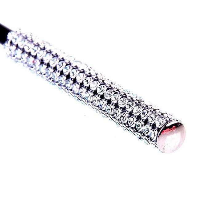 Alternative Couple Flirting Around A Small Feather Whip - Image 5